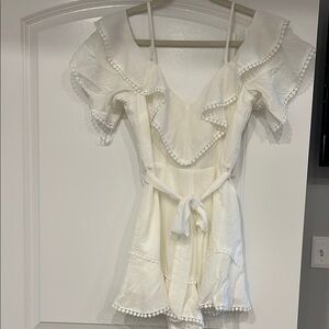 White Ruffled Dress with Pom Pom Trim